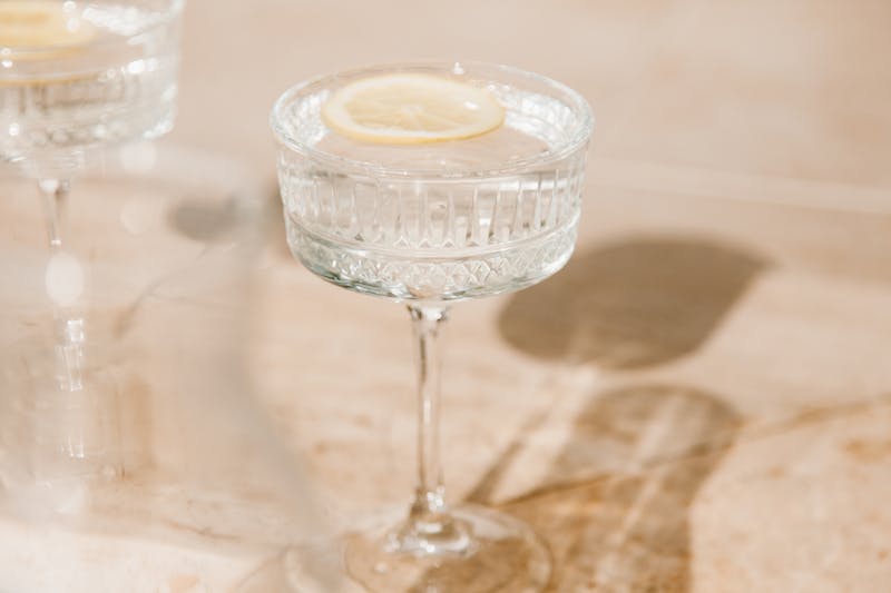 Sparkling water with citrus served in a tall glass