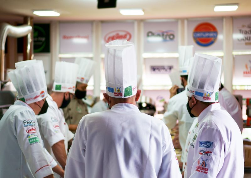 Chopt culinary staff plating a gourmet dish in the kitchen